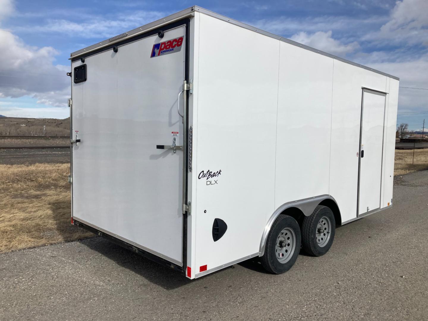 2024 , located at 310 West 1st Ave, Big Timber, MT, 59011, (406) 860-8510, 45.833511, -109.957809 - New Pace American Outback Deluxe 81/2 x 16 Enclosed Cargo, 7k GVW, 81" rear door opening height with beavertail, bonded sides (no screws), v-nose, rear ramp door, 32" side door, (2) 3.5k axles, electric brakes on both axles, LED lights, high performance floor and sidewall material, 16" on center sid - Photo#1